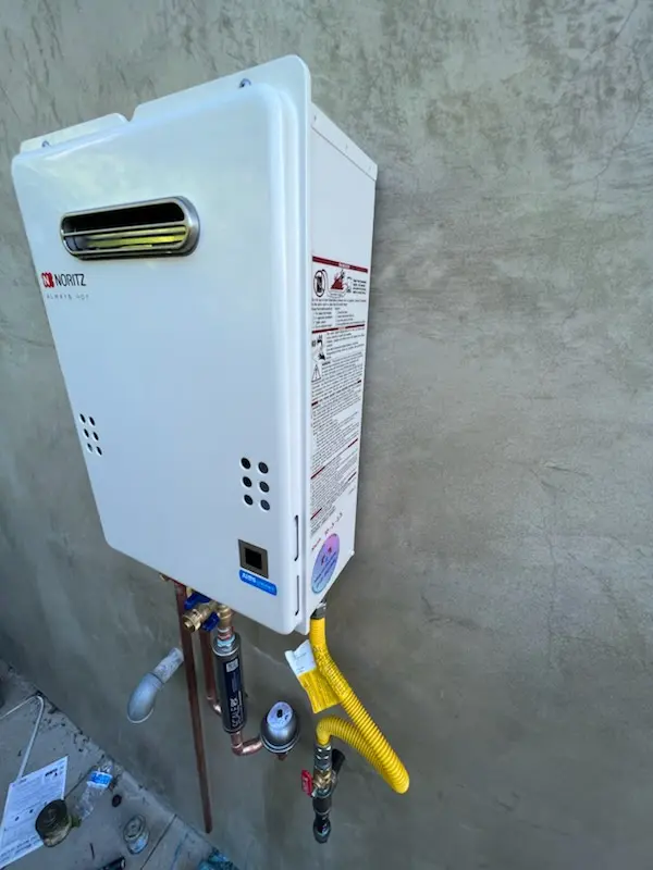 Tankless water heater installation for Comstock homes